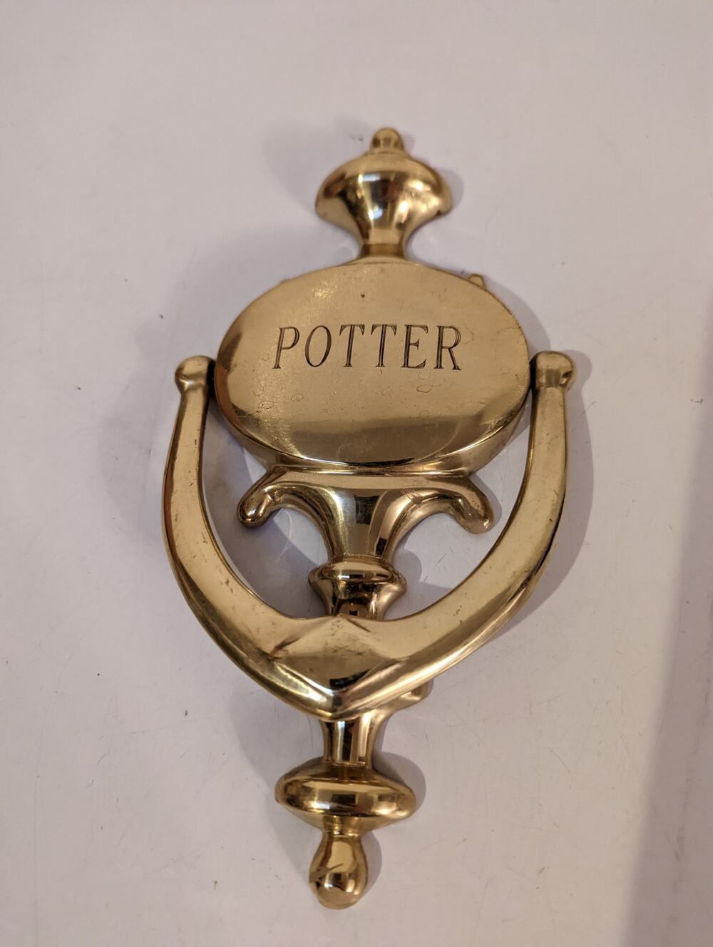 Vintage brass colonial style finial door knocker engraved Potter made in Spain